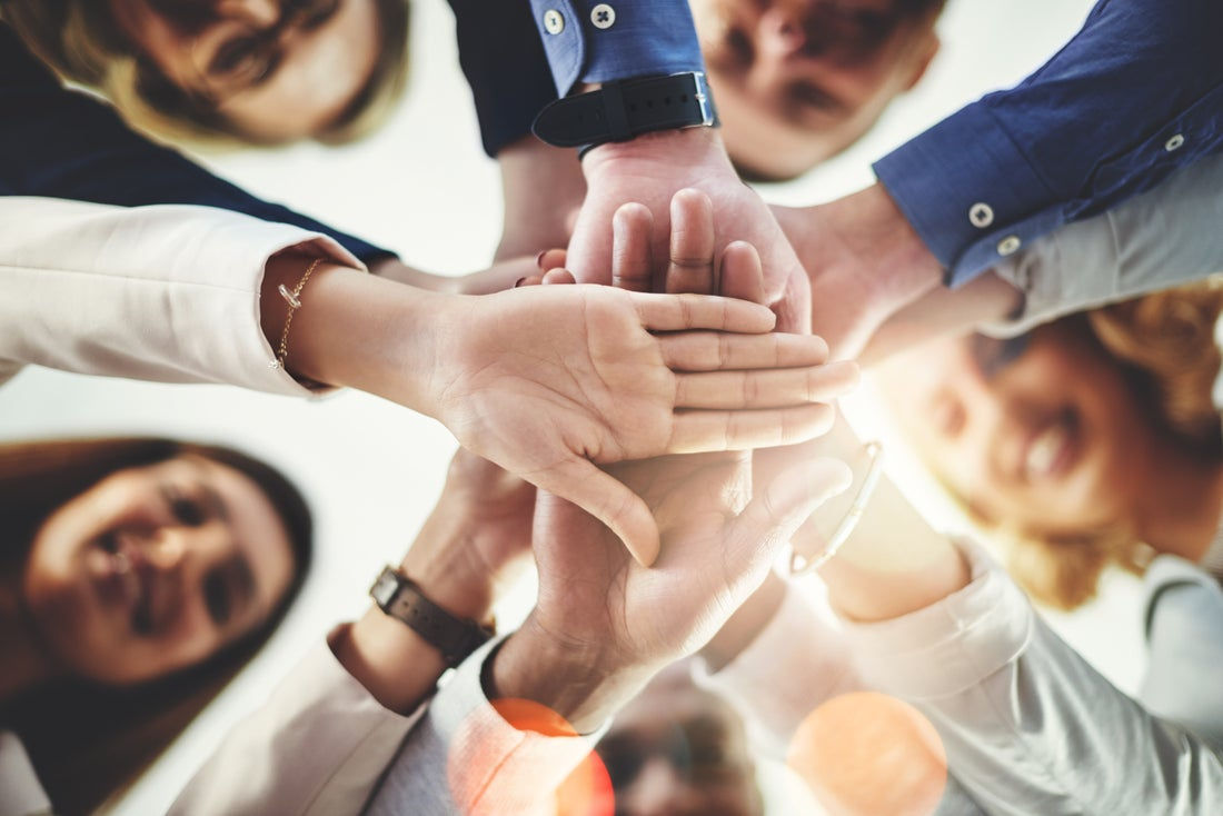 Team hands together