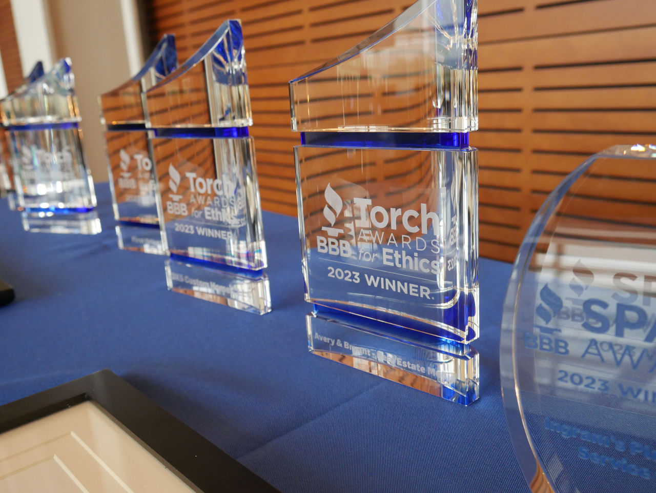 A photo of glass statue awards from BBB's Torch Awards for Ethics