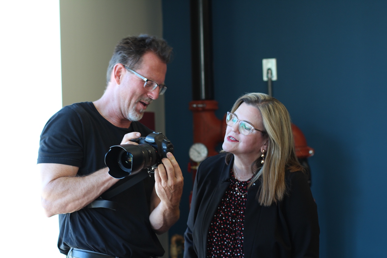 Man and woman looking at camera