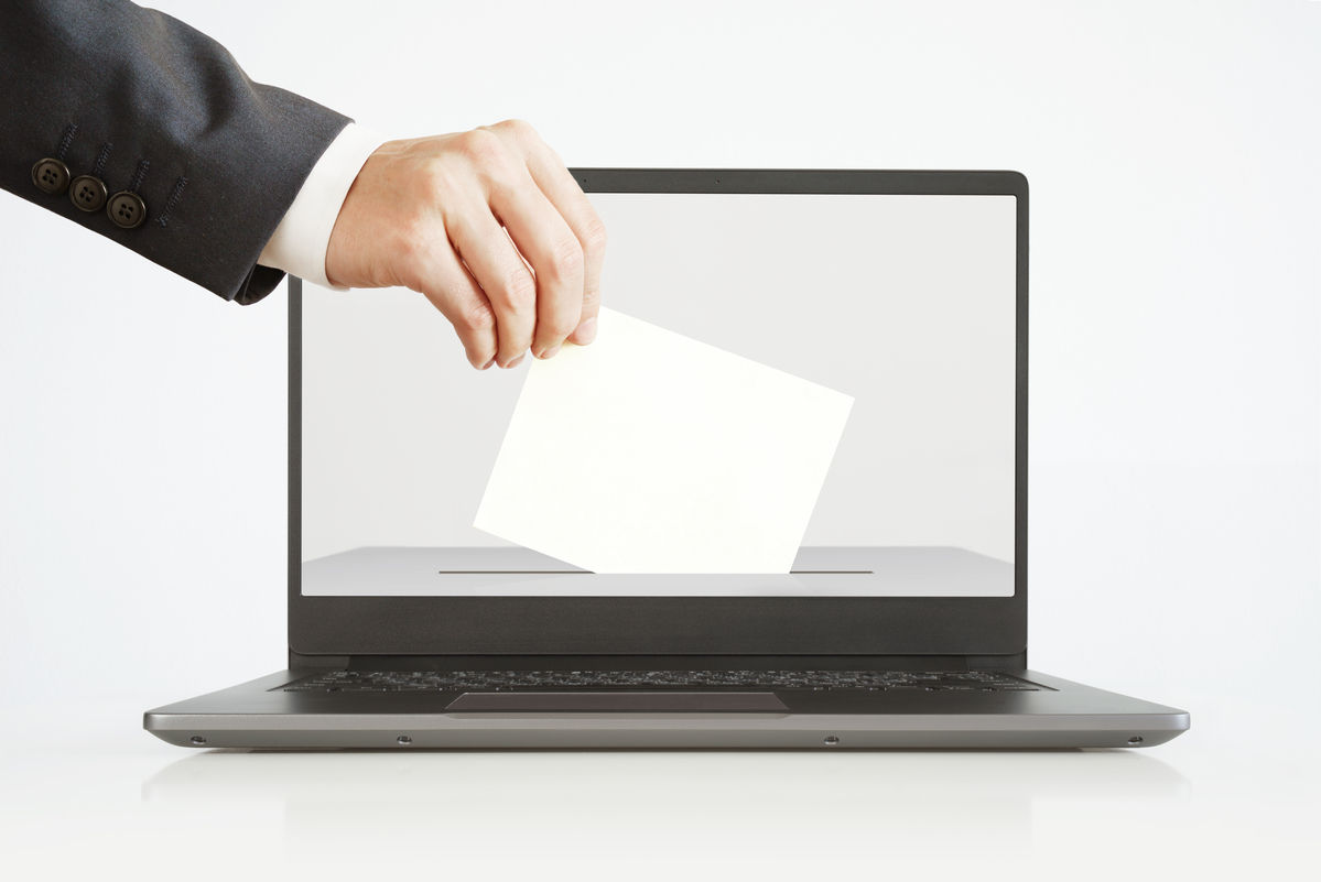 voting ballot in front of computer screen