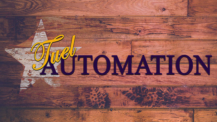 Tuel automation logo on a wood background