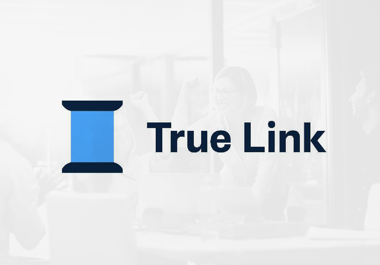 Gray image of business people celebrating with overlay of True Link Financial logo overlayed