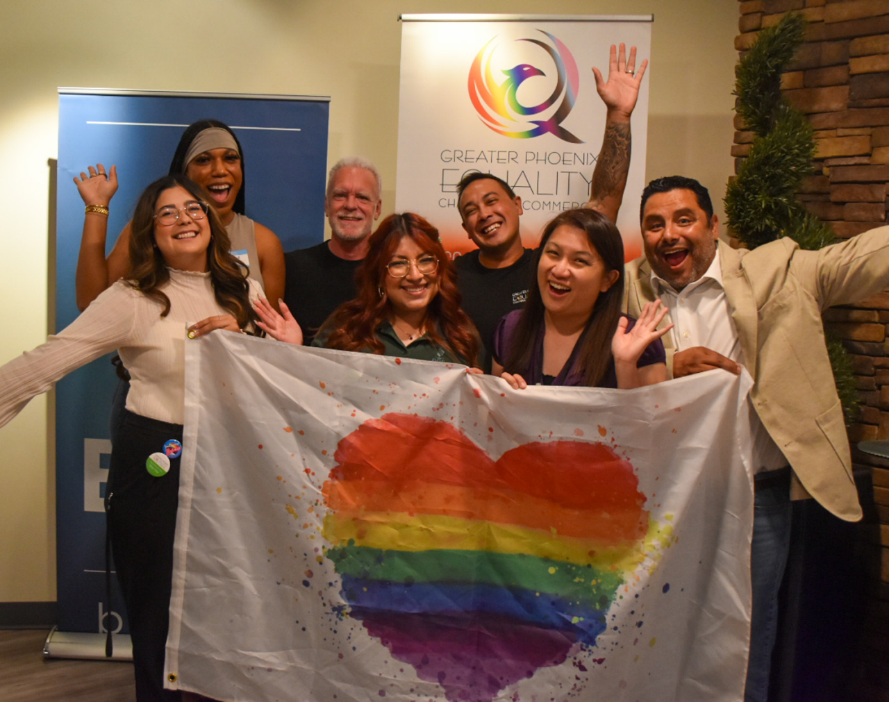 people holding flag with heart