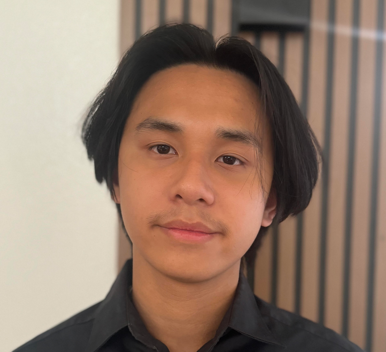 isaac saulog headshot