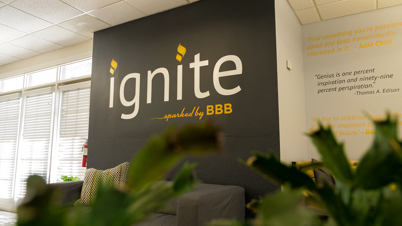 dark gray wall with words ignite sparked by BBB