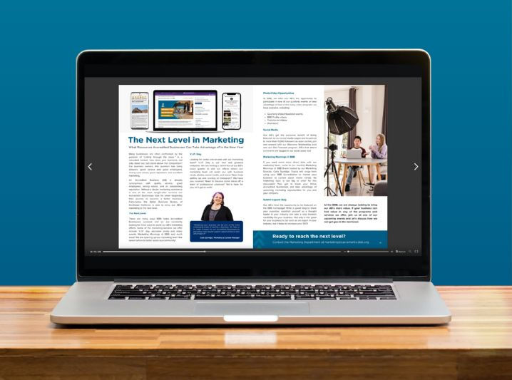 MacBook on a table with two-page advertorial spread from the Northeast California Connection Magazine on the screen