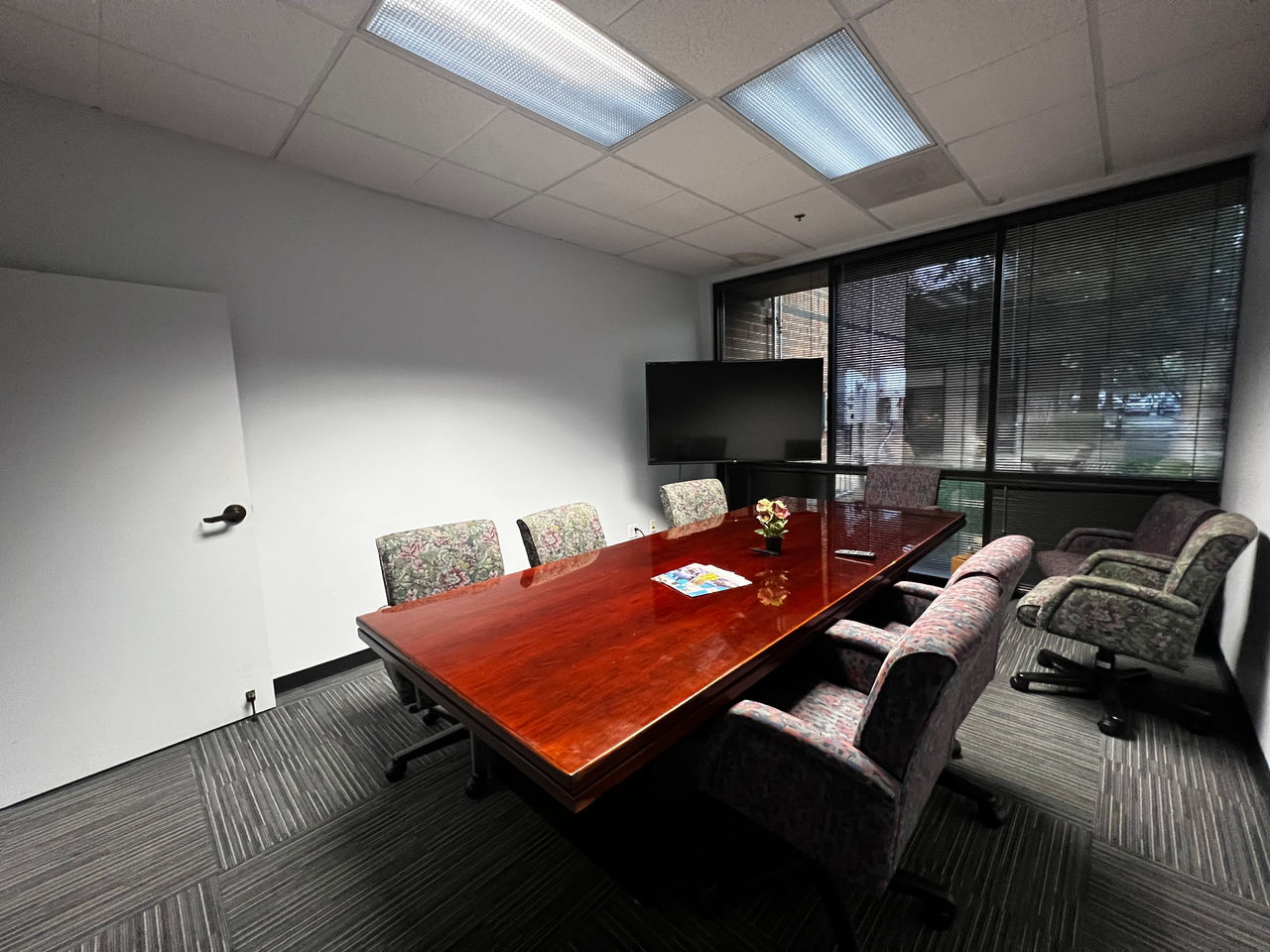 Meeting room with large table, chairs, and large tv, Sacramento conference room