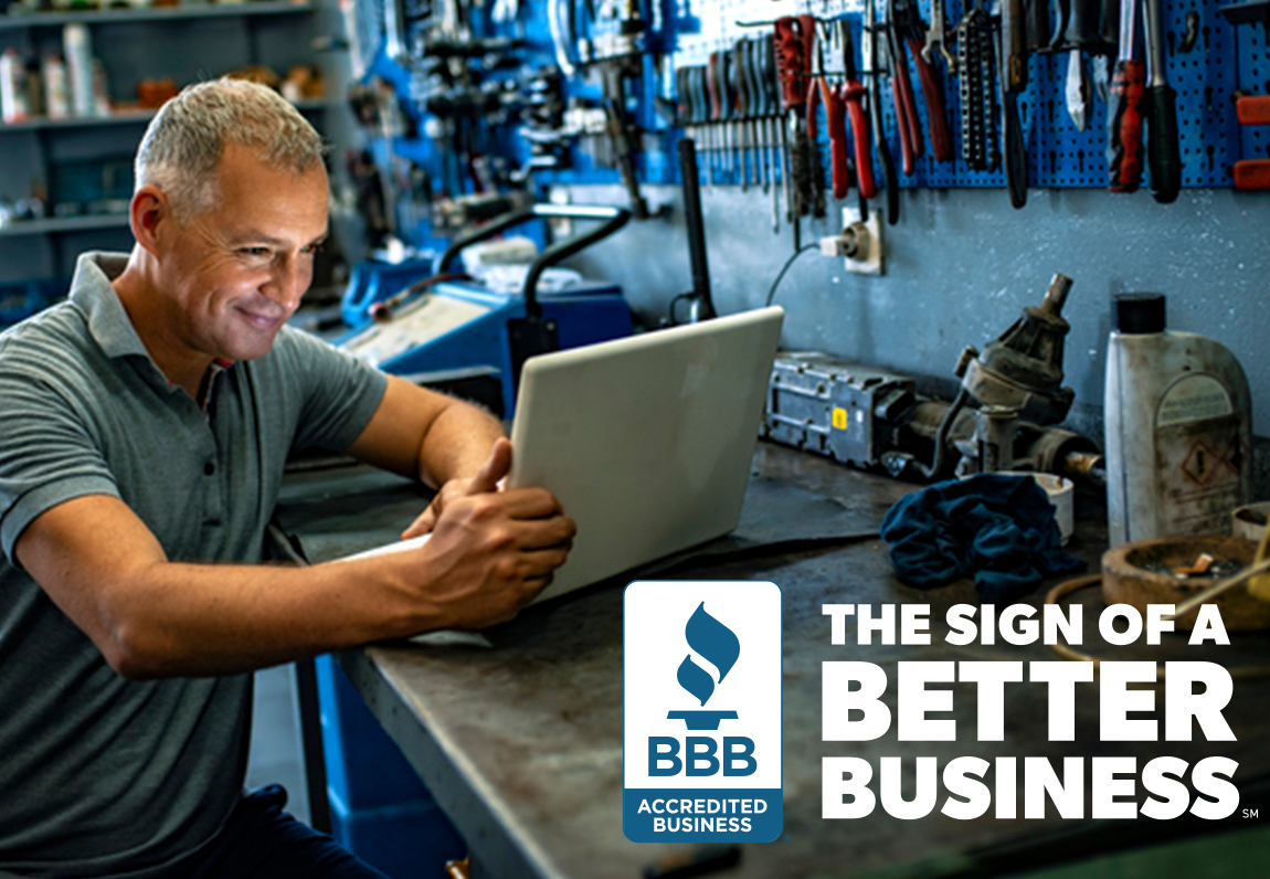 false The Sign of a Better Business mechanic on computer