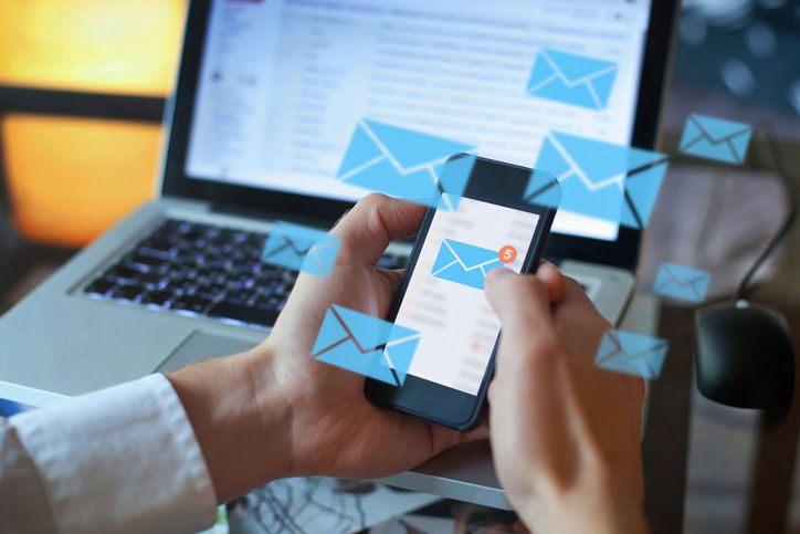 1282806068 email marketing concept, person reading e-mail on smartphone, receive new message