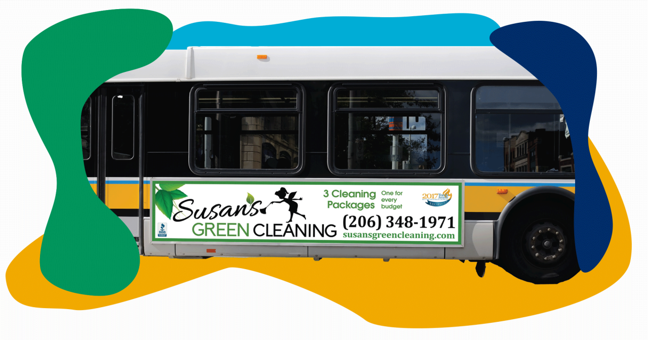 Sideview of a bus with an advertisement for a cleaning company.